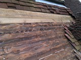 Featheredge boarding re-fixed where possible and renewed where not.